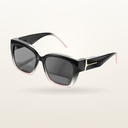 SunFit Ladies fit-over sunglasses, Black and Pink Cross, studio shot on an off-white background