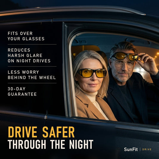 Drive safer through the night - couple in their car at night, he lifts SunFit Drive over his own glasses and she wears her yellow night-driving glasses