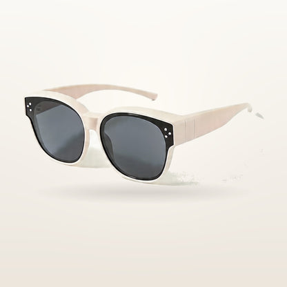 SunFit Kids fit-over sunglasses in white, studio shot on an off-white background