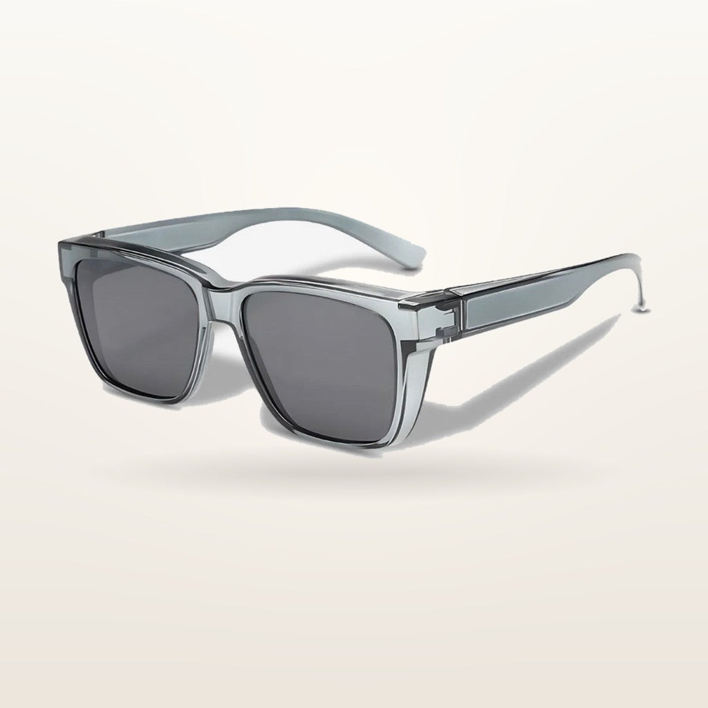 SunFit Men Classic fit-over sunglasses with a transparent grey frame, studio shot on an off-white background
