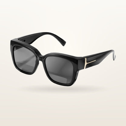 SunFit Ladies fit-over sunglasses, Onyx Cross, studio shot on an off-white background